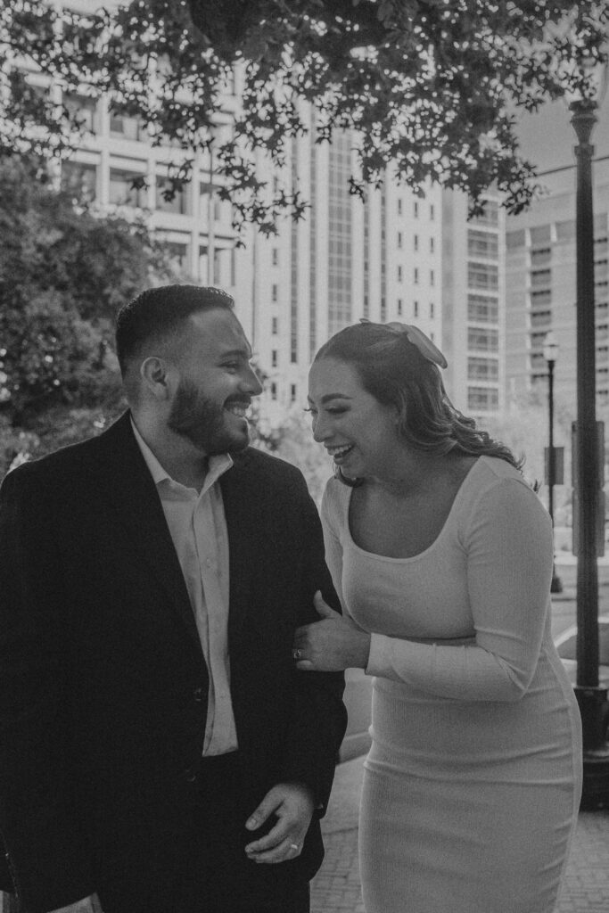 Couple laughing and having fun during their Downtown Houston Elopement.