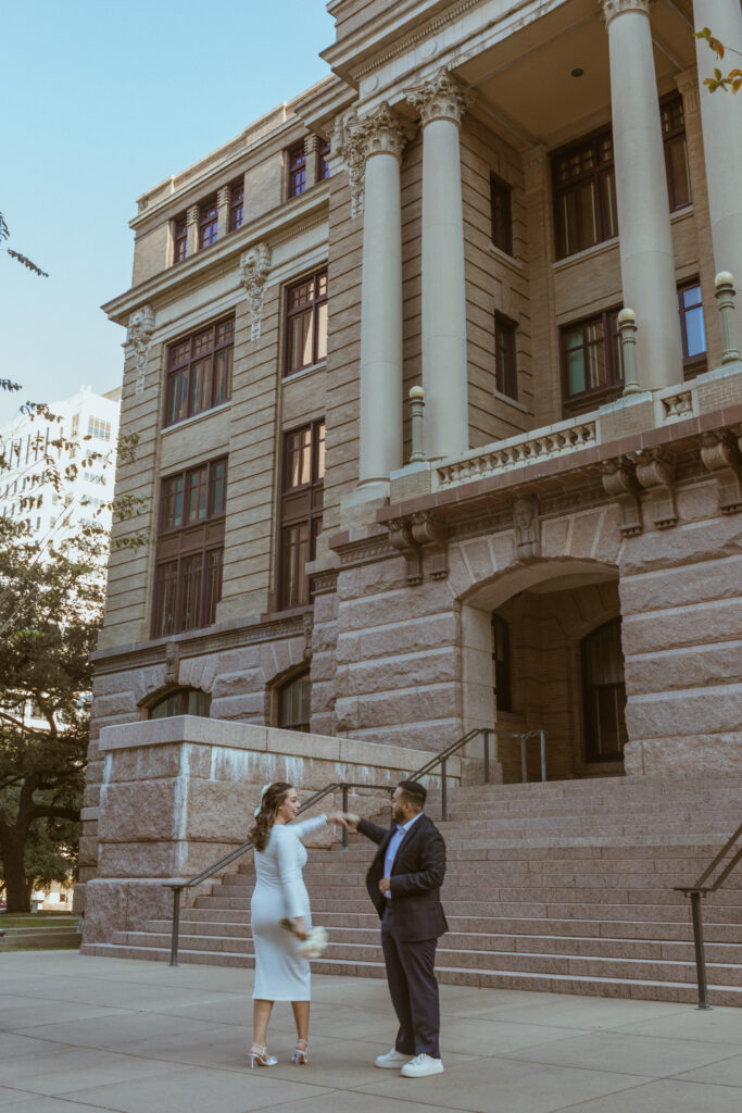 Groom spinning the bride at their Downtown Houston Elopement.
