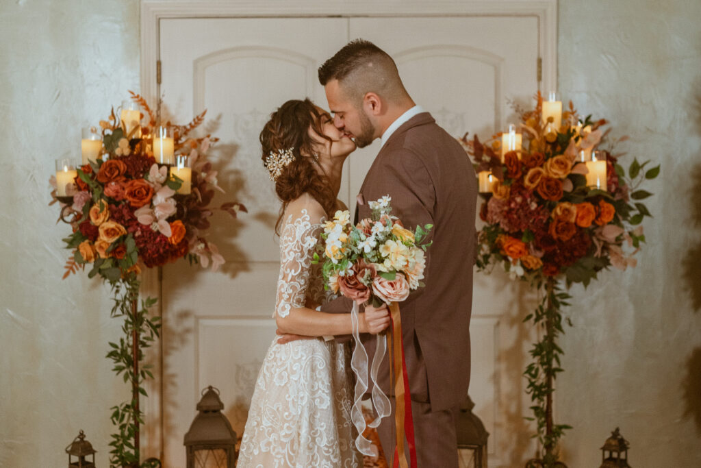 Couple kissing after their wedding ceremony