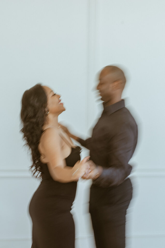 Blurry photo of a couple posing for summer photoshoot ideas.