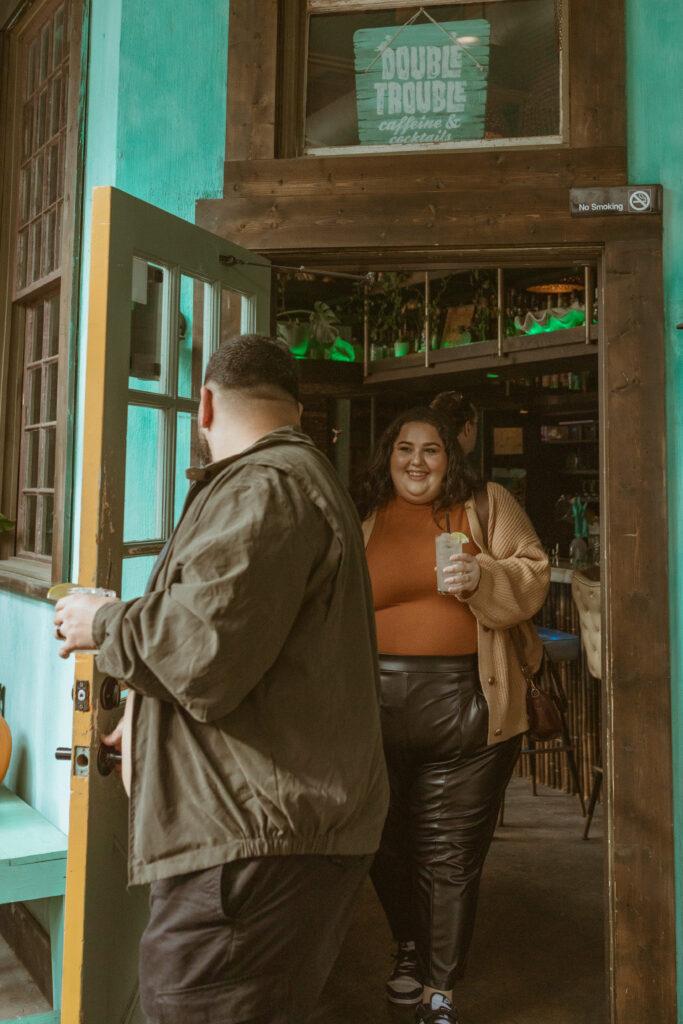 Couple leaving a restaurant after 1st Year Anniversary Photoshoot.