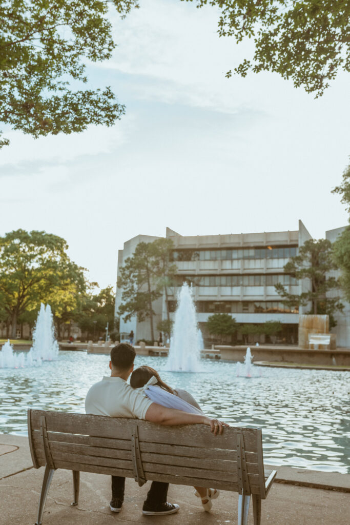 Couple sitting on a bench at the University of Houston