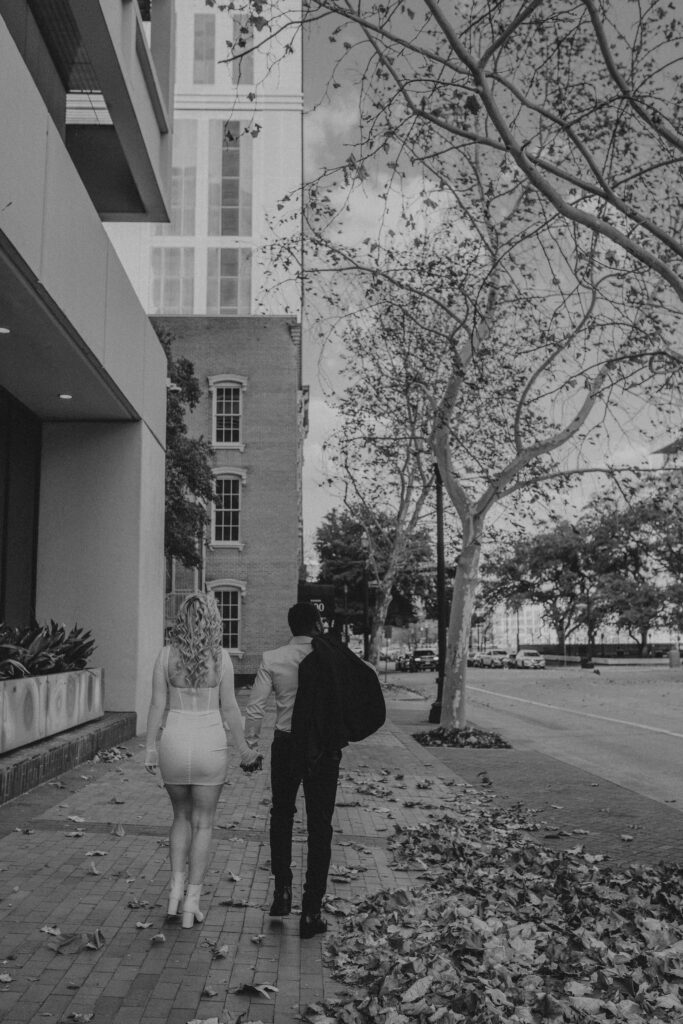 Couple walking down the street during a winter photoshoot